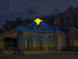Microtel Inn & Suites logo
