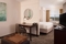 SpringHill Suites Orlando Airport - The standard room with a king size bed has a separate living room with a sleeper sofa, a microwave, and mini refrigerator.