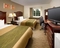 Comfort Inn & Suites Dulles Gateway - The standard room with two queen beds includes a 37