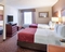 Comfort Suites Chantilly Dulles Airport - The standard room with two queen beds includes a refrigerator, microwave, and coffee maker.