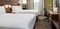 Holiday Inn Express Atlanta Airport - The standard, spacious room with 2 queen beds includes free WIFI, mini refrigerator and coffee maker.