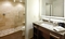 Homewood Suites - Each guest bathroom features granite counter tops and modern amenities.