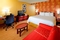 Courtyard Columbus Airport - The standard room with a king size bed includes a full size sleeper sofa.