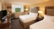 Hilton Crystal City - The standard room with two queen beds includes an LCD TV with premium channels, and a work desk for handling your business needs. 
