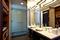 Aloft Dulles North - The standard guest bathroom is features an oversized walk in shower, and modern decor.