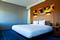Aloft Dulles North - Each room features a platform king sized bed, desk with chair, and a spacious bathroom.