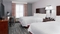 Hampton Inn & Suites Orlando Airport - The standard room with two queen beds includes a 37