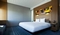 Aloft Baltimore Washington International Airport - These contemporary rooms with a queen bed includes a 42 inch LCD TV, free WiFi, plush bedding, and a stylish bathroom with an oversized walk-in shower. 