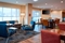 TownePlace Suites by Marriott Grand Rapids Airport - The lobby has a variety of seating to suit everyone.
