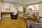 Candlewood Suites - Relax in the hotel lobby while waiting on your transfers to the airport.