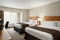 Country Inn and Suites - The standard two queen beds include a TV, free WIFI, refrigerator, microwave, and coffee maker. 
