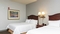Hampton Inn & Suites Indianapolis Airport - The standard room with two queen beds includes a 43