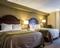 Comfort Inn - The standard room with two queen beds includes a flat screen TV, free WIFI, refrigerator, and coffee maker.