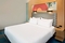 Aloft Green Bay - The standard, spacious king room includes free WIFI, mini refrigerator and coffee maker.
