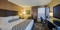 Crowne Plaza Hotel Newark Airport - The standard king bed room includes a refrigerator and coffee/tea maker, a 42 inch TV, and free WiFi.