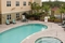 Residence Inn Orlando Airport - Relax and enjoy time with family and friends at the outdoor pool.