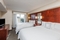 Residence Inn Orlando Airport - The standard room with 2 queen beds has a separate living, dining, and kitchen area. 