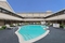 Ramada by Wyndham Boston - Relax and unwind in the hotel's large outdoor pool.