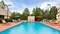 Country Inn & Suites Airport South - The Country Inn and Suites Airport South has an outdoor pool to help you relax and rejuvenate during your stay.