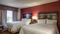 Hampton Inn & Suites by Hilton Detroit Airport - Romulus - The standard room with two queen beds includes free WIFI, refrigerator, and coffee maker.