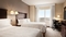 Hampton Inn & Suites Washington-Dulles - The standard, spacious room with 2 double beds includes free WIFI, microwave, mini refrigerator and a coffee maker.