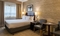 Sonesta Chicago O'Hare Airport - The standard room with king size bedding includes a HDTV, refrigerator, microwave, and free WiFi.