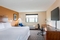 Four Points by Sheraton Milwaukee Airport - The standard king room includes complimentary WiFi.