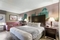 Clarion Pointe Greensboro Airport - The standard, spacious king room includes free WIFI, mini refrigerator and coffee maker.