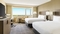 DoubleTree by Hilton Orlando Airport - The standard room with two double beds includes a 50