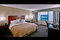 Wyndham Garden Hotel Philadelphia International Airport - The standard king bed features a 32-inch flat panel LCD TV, free Wi-Fi, and desk with chair. Guest bathrooms have also been updated with beautiful granite countertops and new massage showerheads.