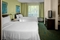 Springhill Suites Columbus Airport - The standard room with two double beds includes free WiFi, a 37 inch TV, refrigerator and microwave.