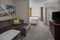 SpringHill Suites Chicago O'Hare - The standard room with a king size bed includes a full size sleeper sofa.