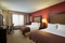 DoubleTree by Hilton Chicago Midway Airport - The standard room with two queen size beds has enough room for the family.