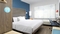 Tru by Hilton Denver Airport 14 DAYS PARKING - The standard, spacious king room includes free WIFI, mini refrigerator and flat screen TV.