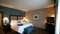 Hampton Inn & Suites Charlotte Airport - The standard, spacious king room includes free WIFI, mini refrigerator and coffee maker.