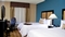 Hampton Inn & Suites Charlotte Airport - The standard room with two queen beds includes a 32
