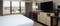 Hilton Los Angeles International Airport - The standard room with a king bed includes a standard desk, chair, alarm clock radio with MP3 connection, coffeemaker, iron, ironing board, and a marble bathroom with hair dryer.