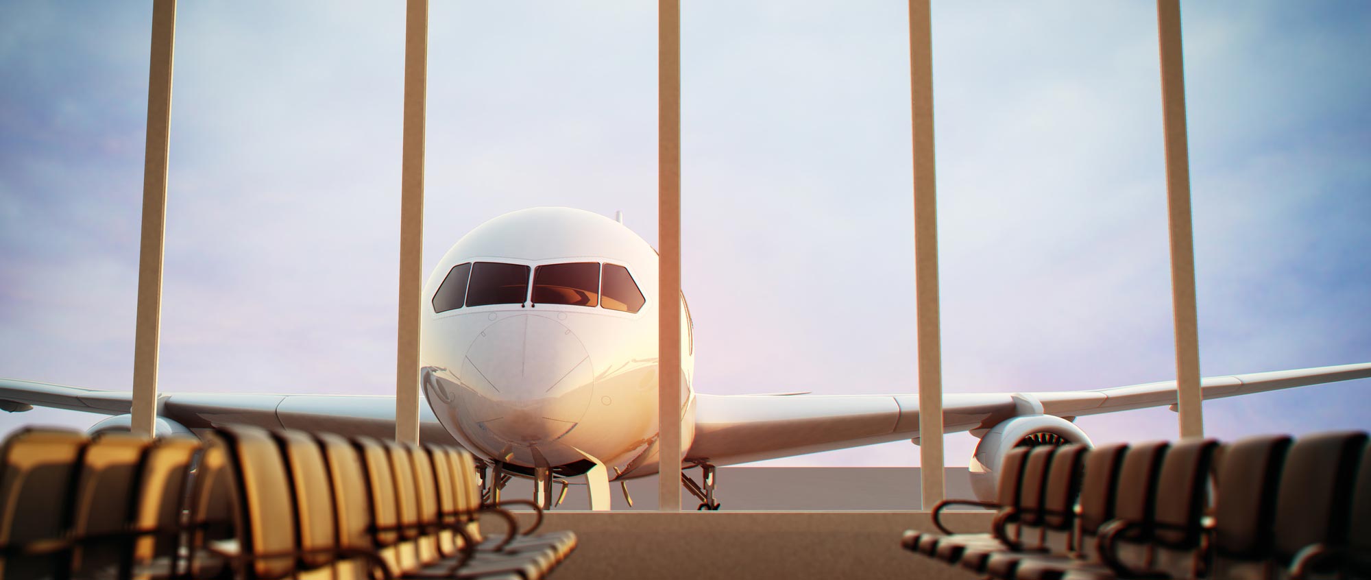 Airplane viewed through an airport terminal window