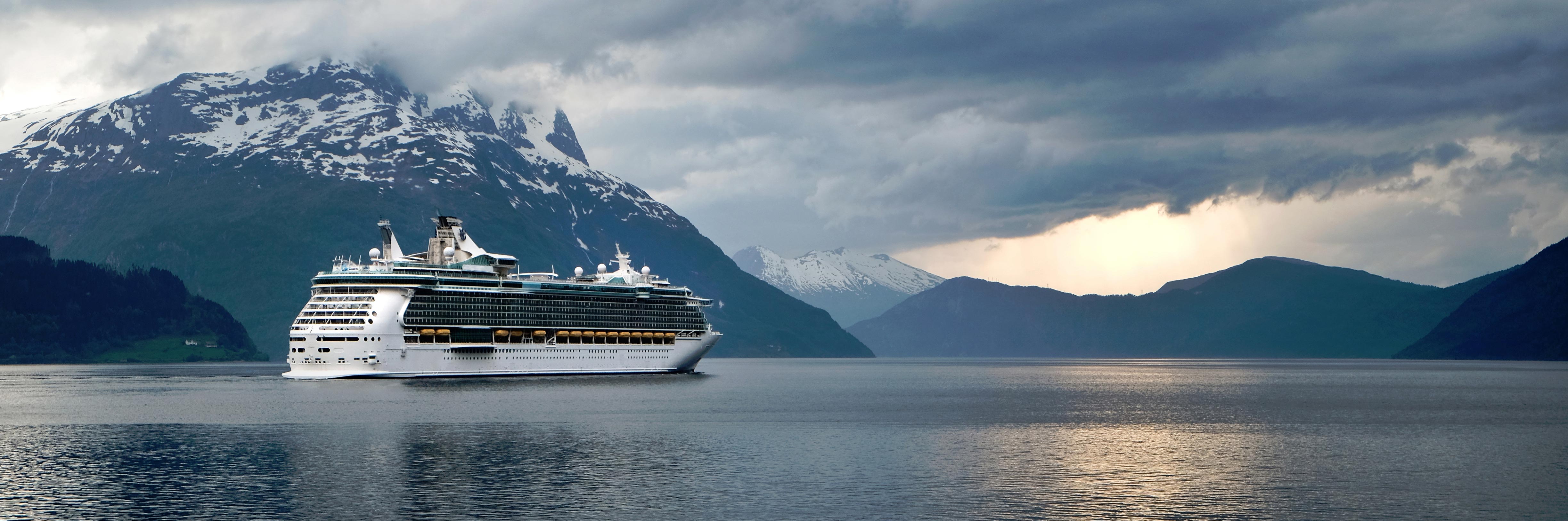 Cruise ship sailing near a cruise port